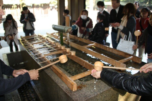 Cleansing before entering the Meiji Jungu Temple